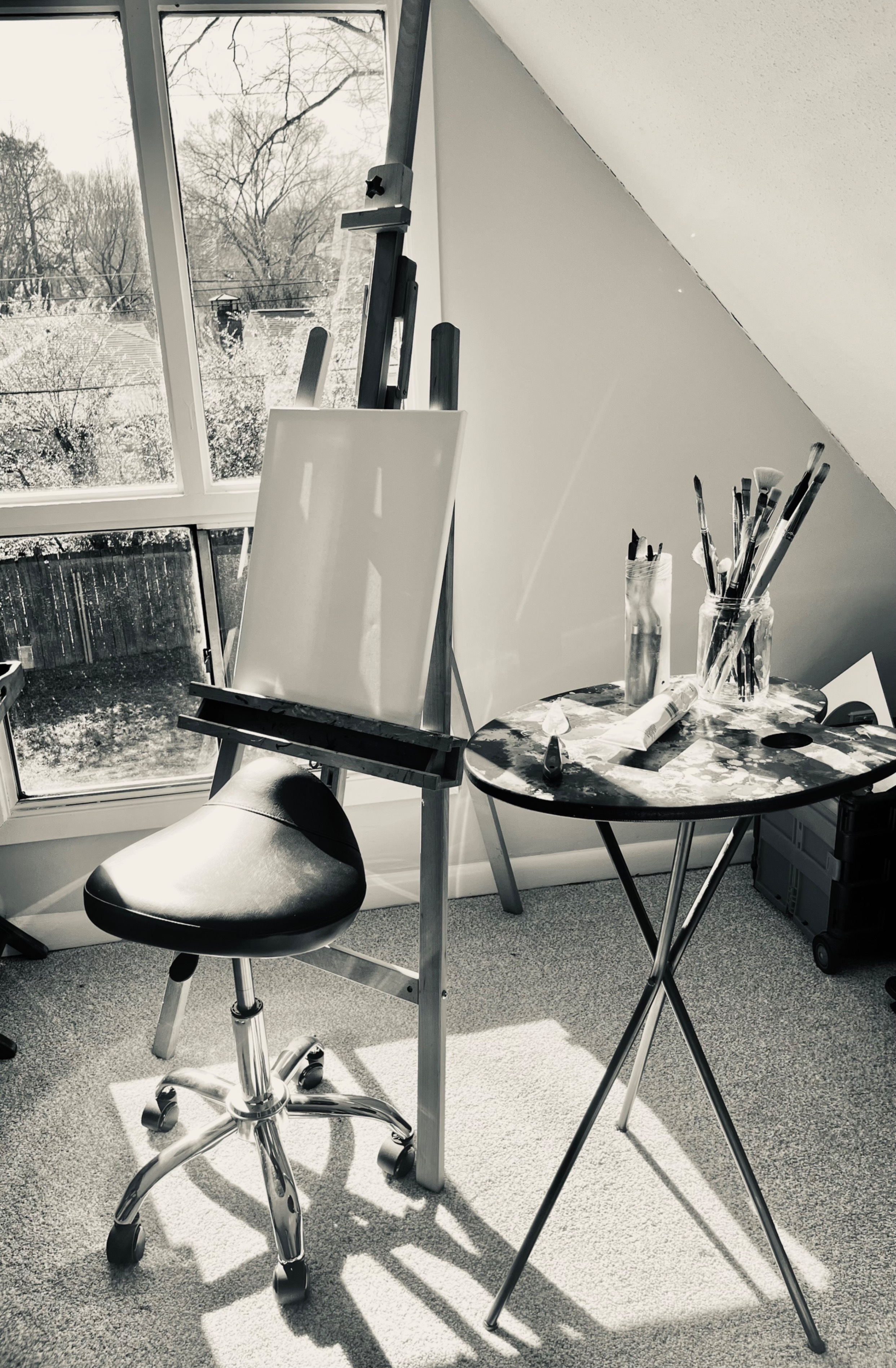 artist painting in studio